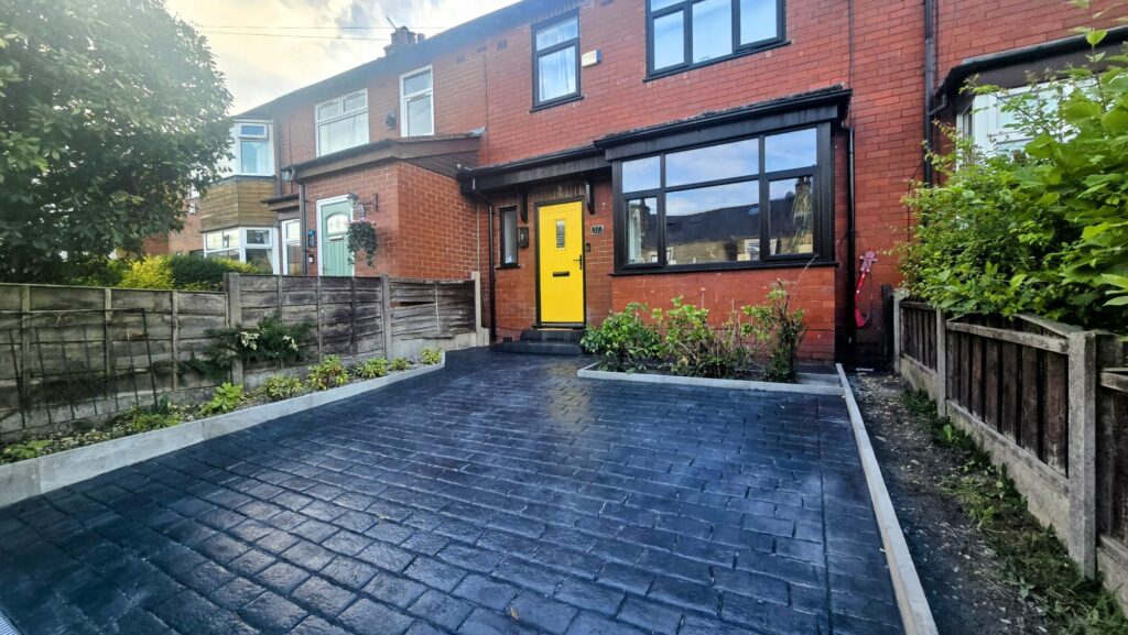 New garden driveway conversion with matte concrete driveway in Ramsbottom