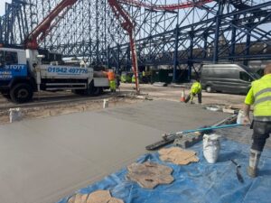 Concrete team levelling under the big one